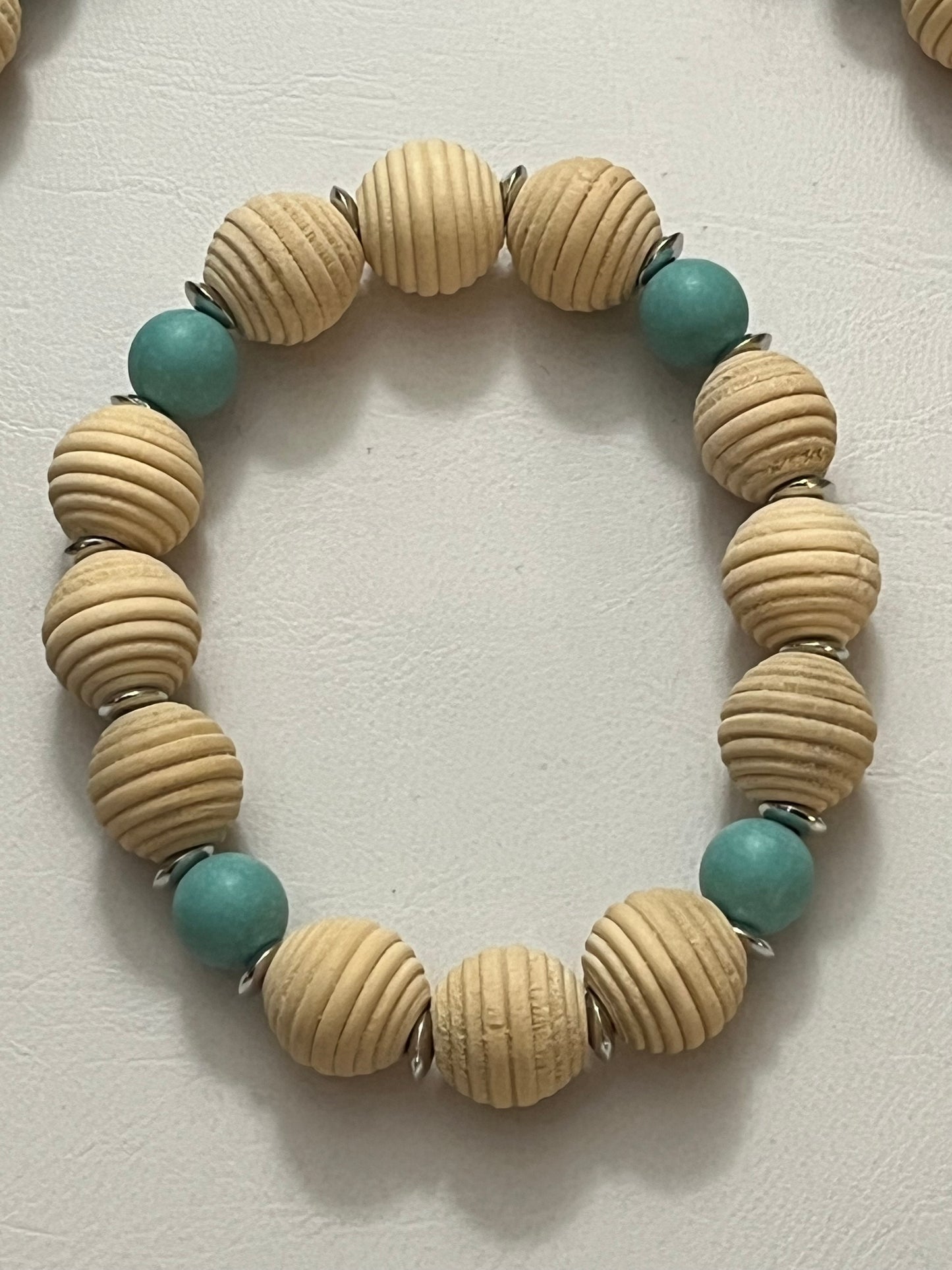 Matching aqua and wood bracelet with beachy tones