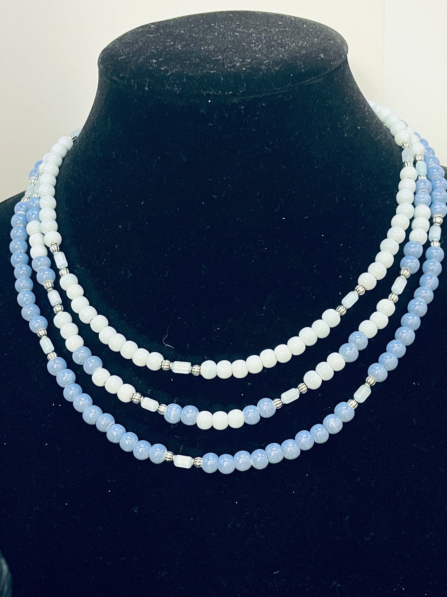 Royal blue layered necklace with silver accents and elegant court‑inspired design
