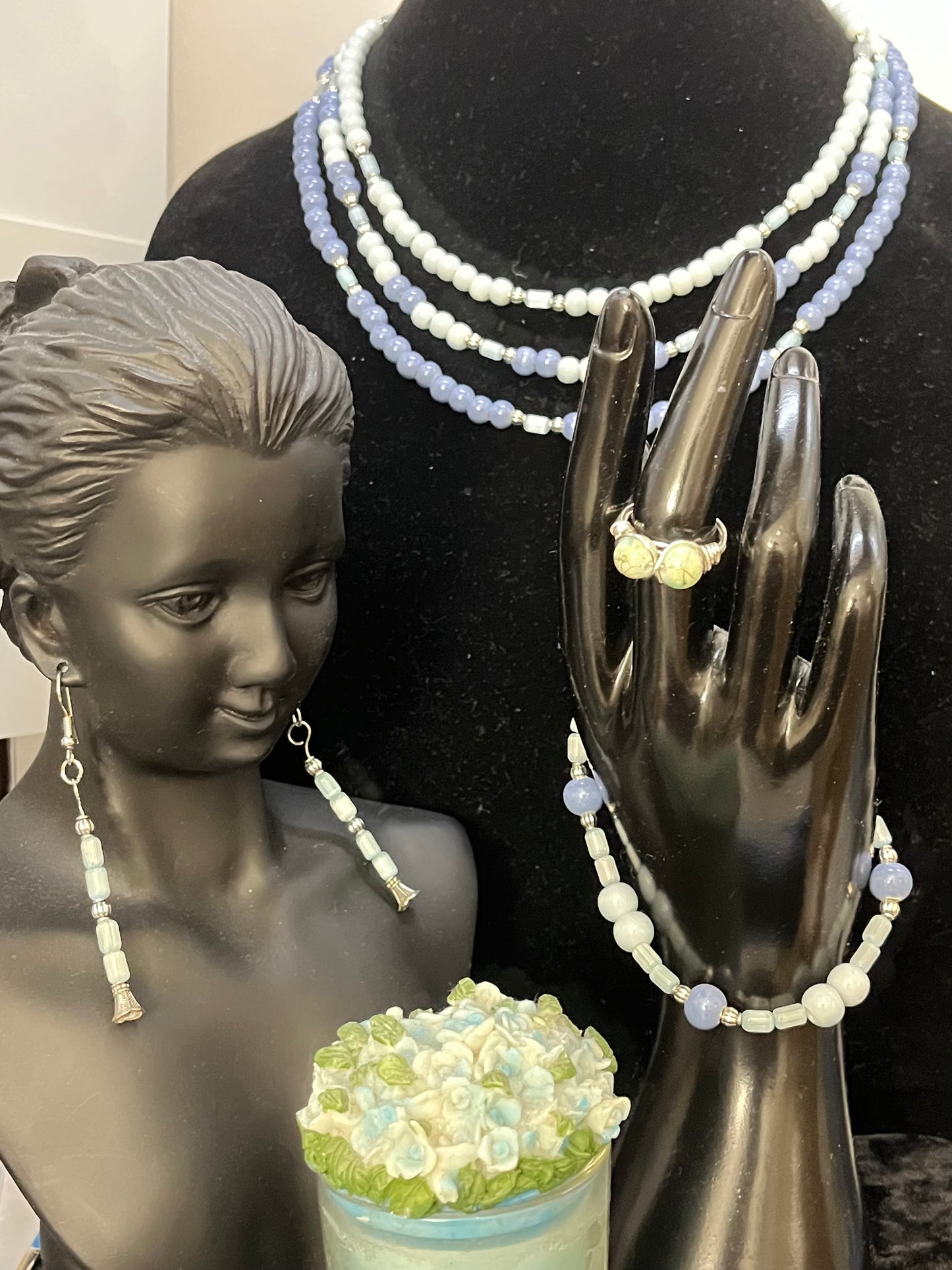 Full Lady of the Blue Court jewelry set displayed on soft backdrop