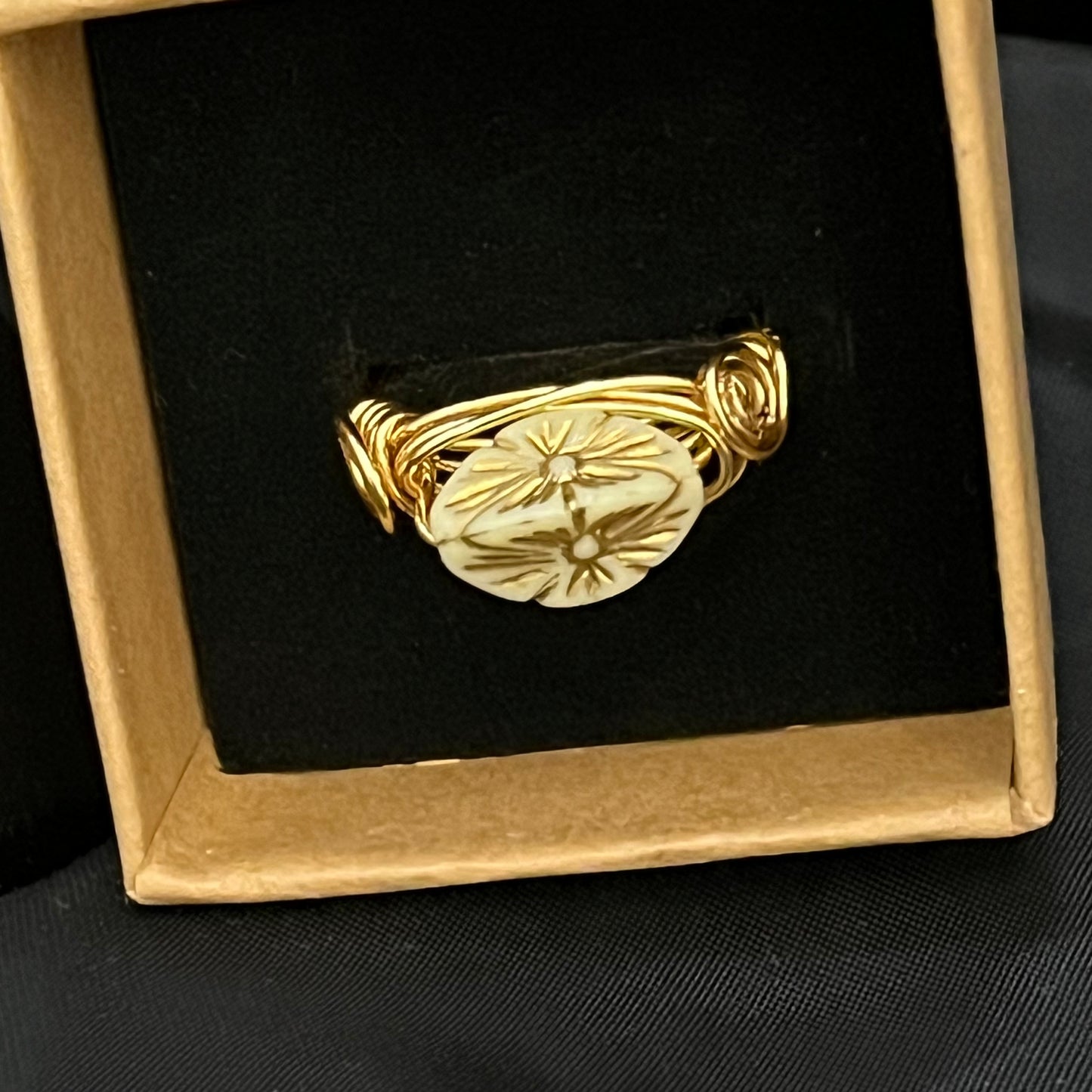 Close-up of Boho ring with carved details