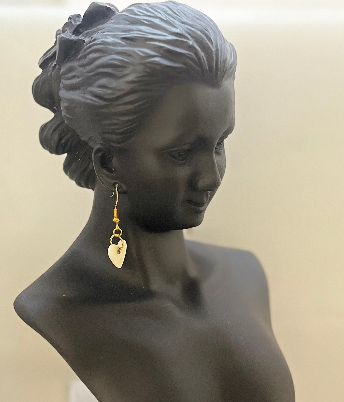 Mother of pearl earring close-up by Eliza Joe Jewelry