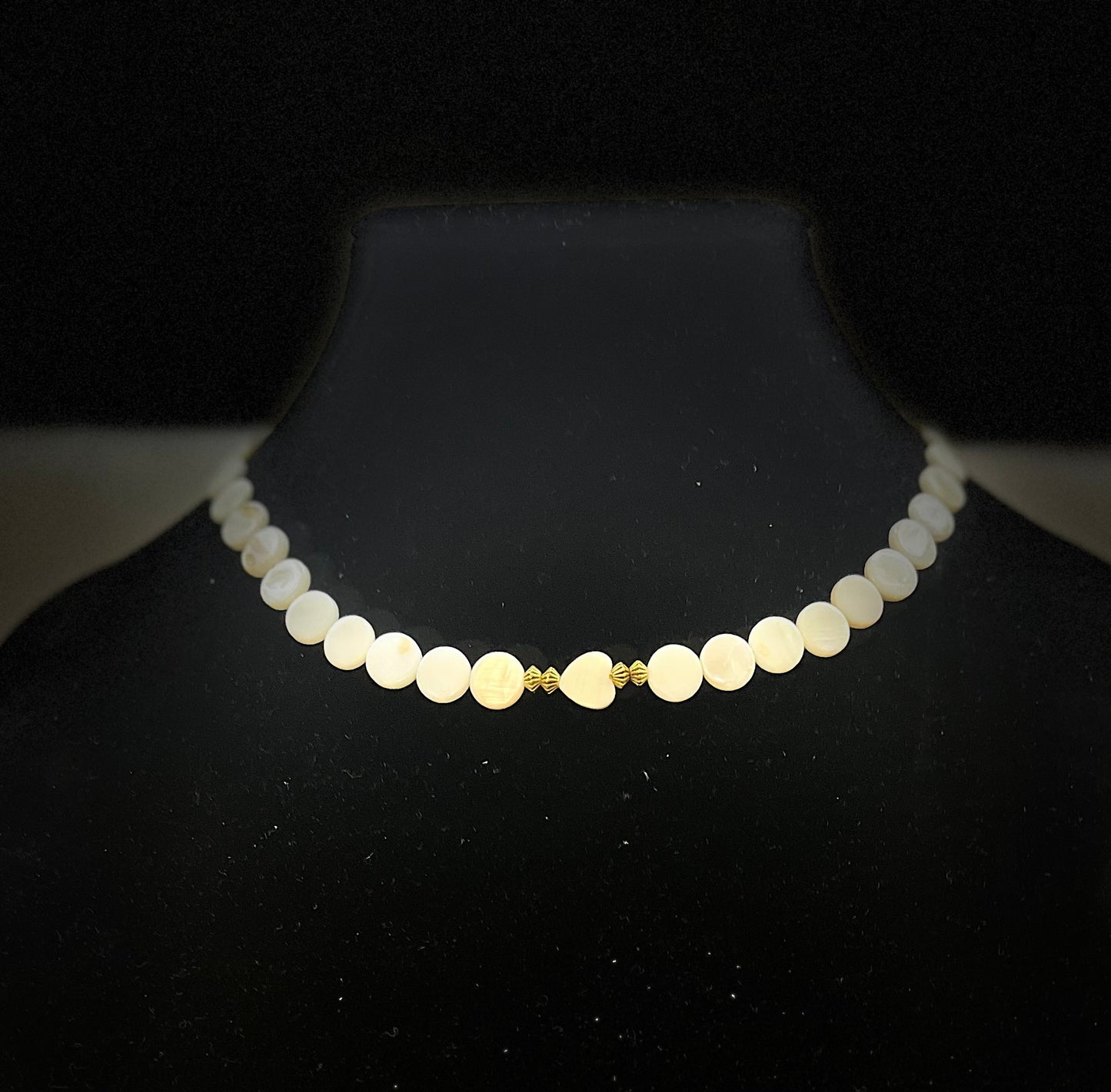 Close‑up of mother of pearl jewelry set with elegant shine