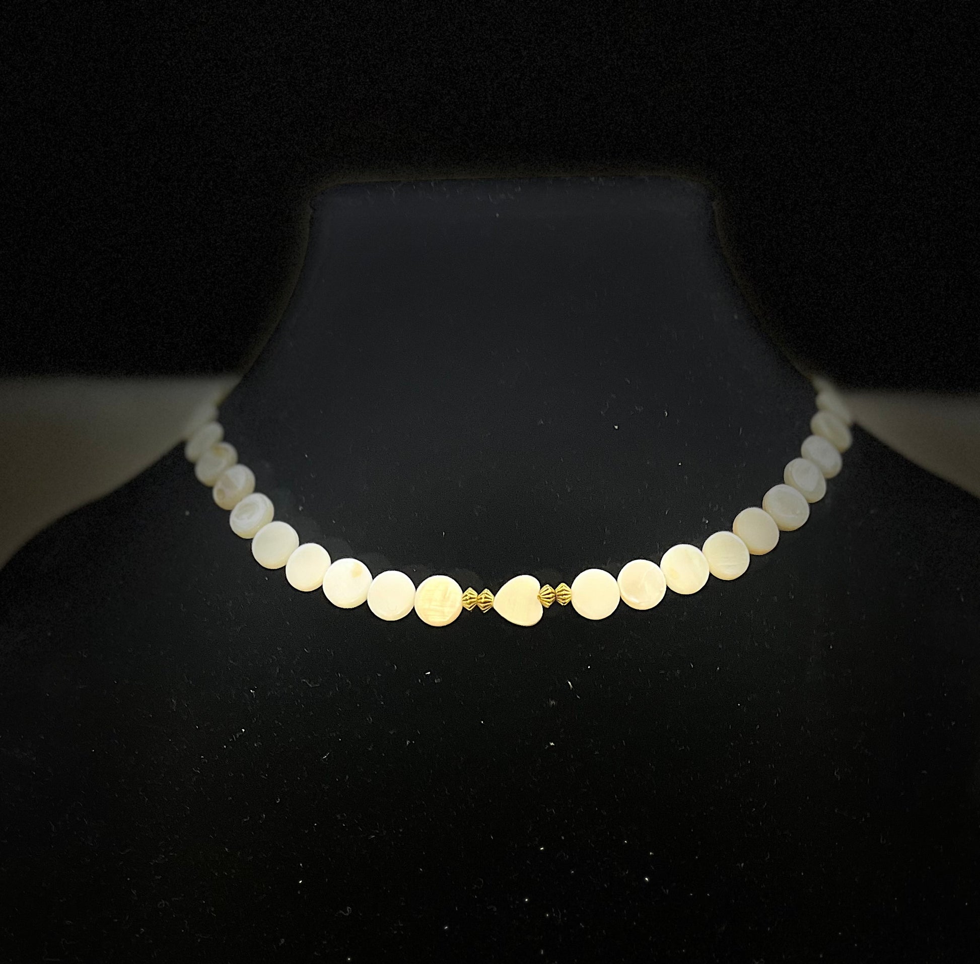 Close‑up of mother of pearl jewelry set with elegant shine