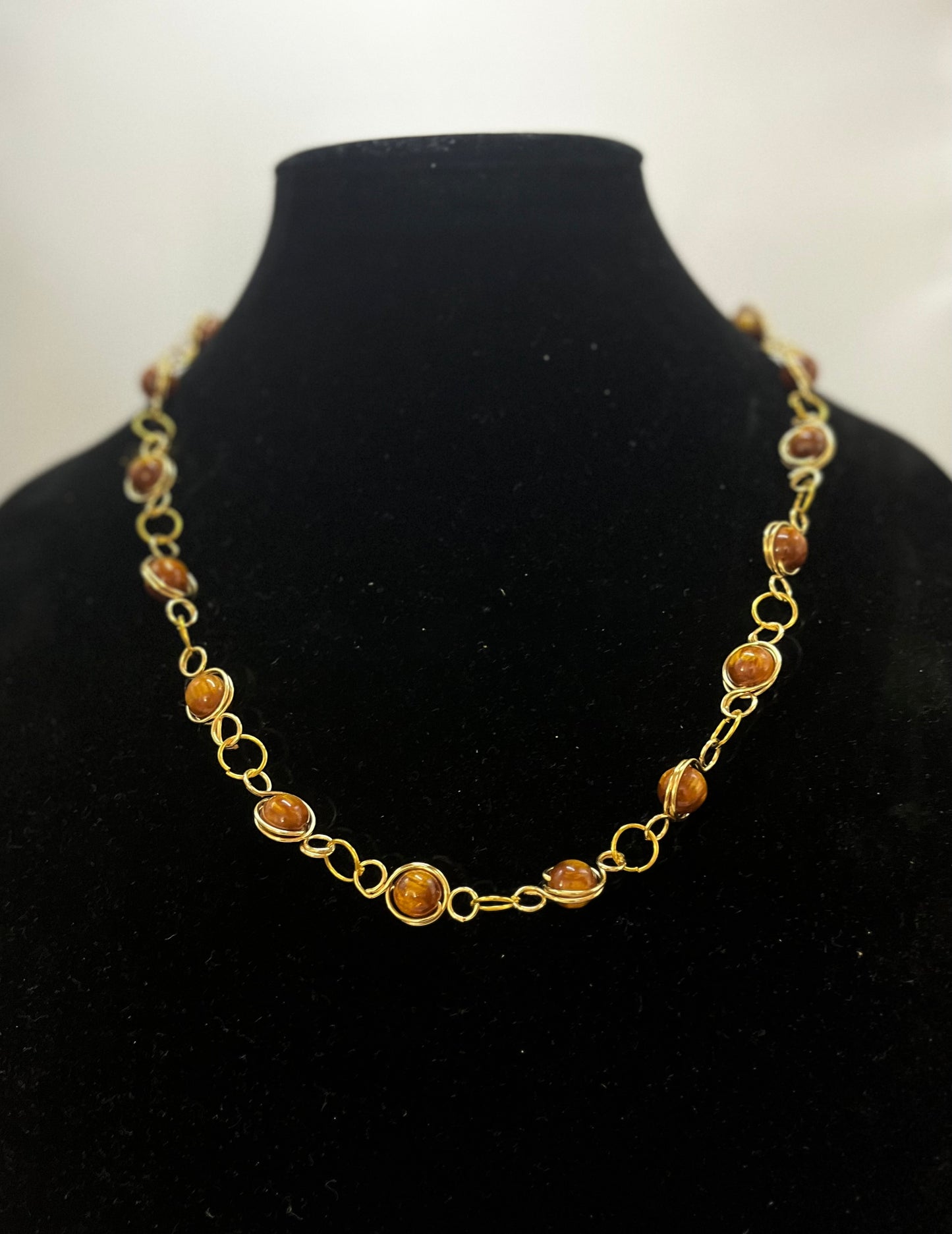 Gold‑tone chain necklace with polished elegant finish