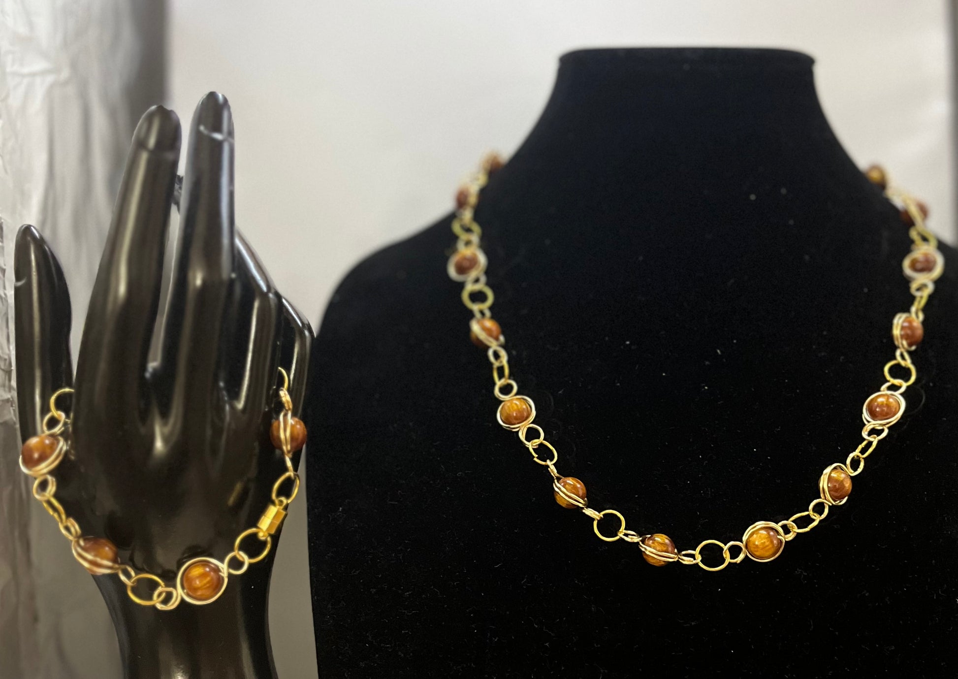 Matching gold chain bracelet with refined style