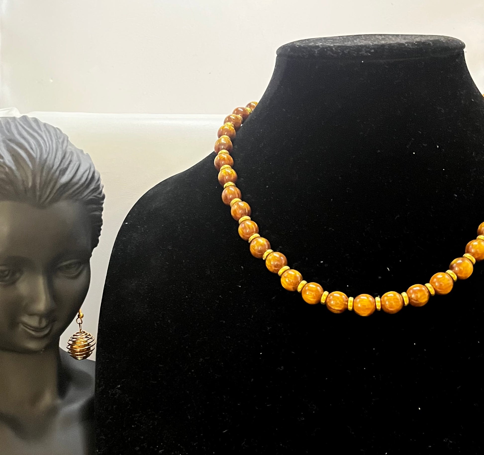 Full caramel butterscotch jewelry set displayed on neutral backdrop