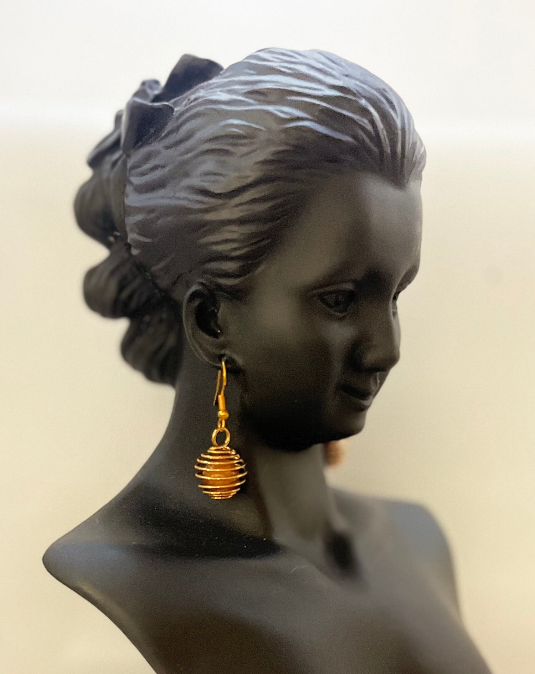 Matching caramel earrings with earthy bead design