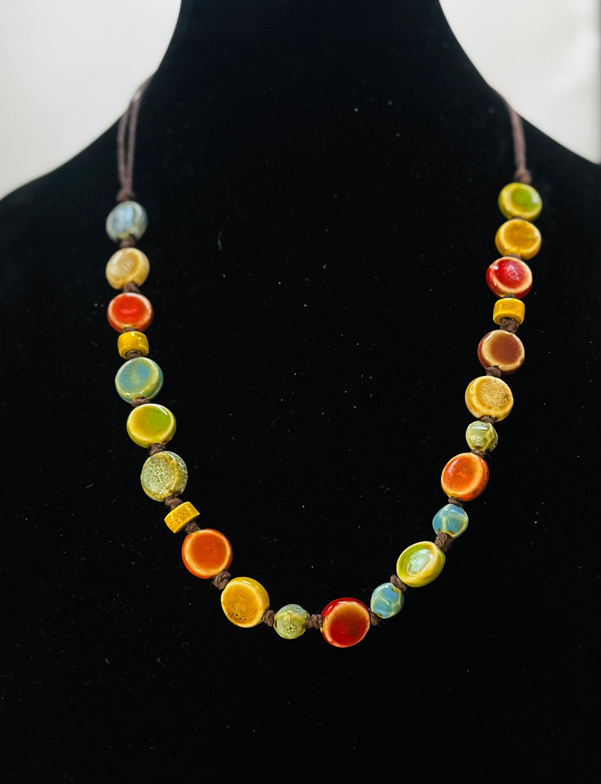 Close-up of Bohemian necklace with rustic bead design