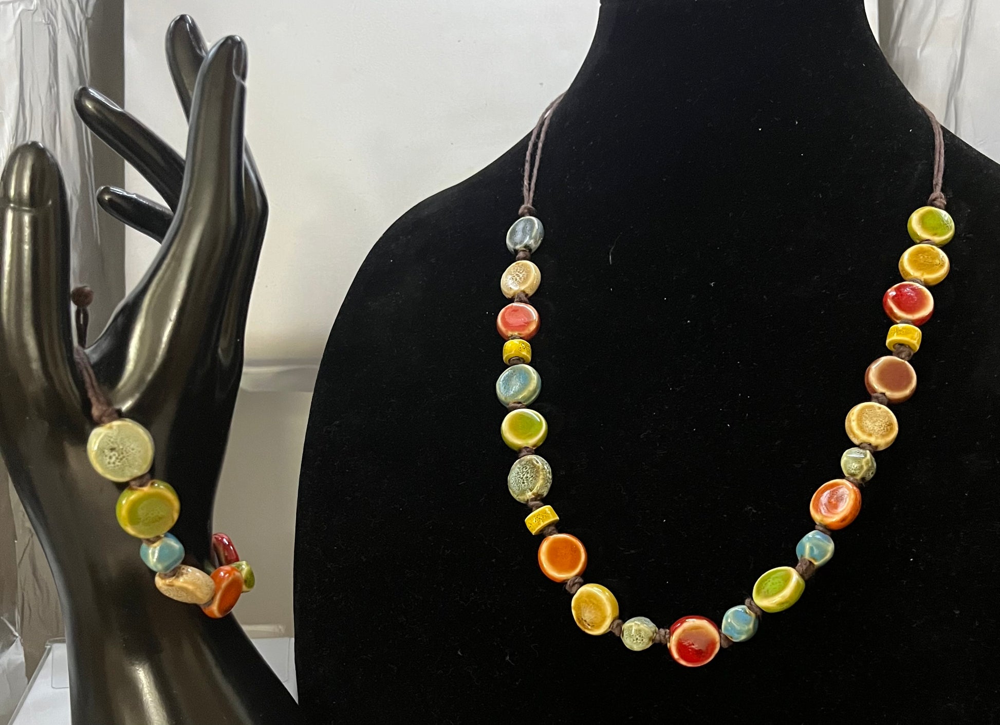 Close‑up of bohemian jewelry set with handcrafted details