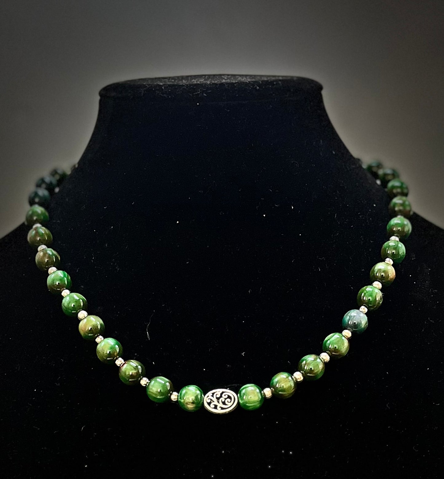 Forest green beaded necklace with rich jewel‑tone color