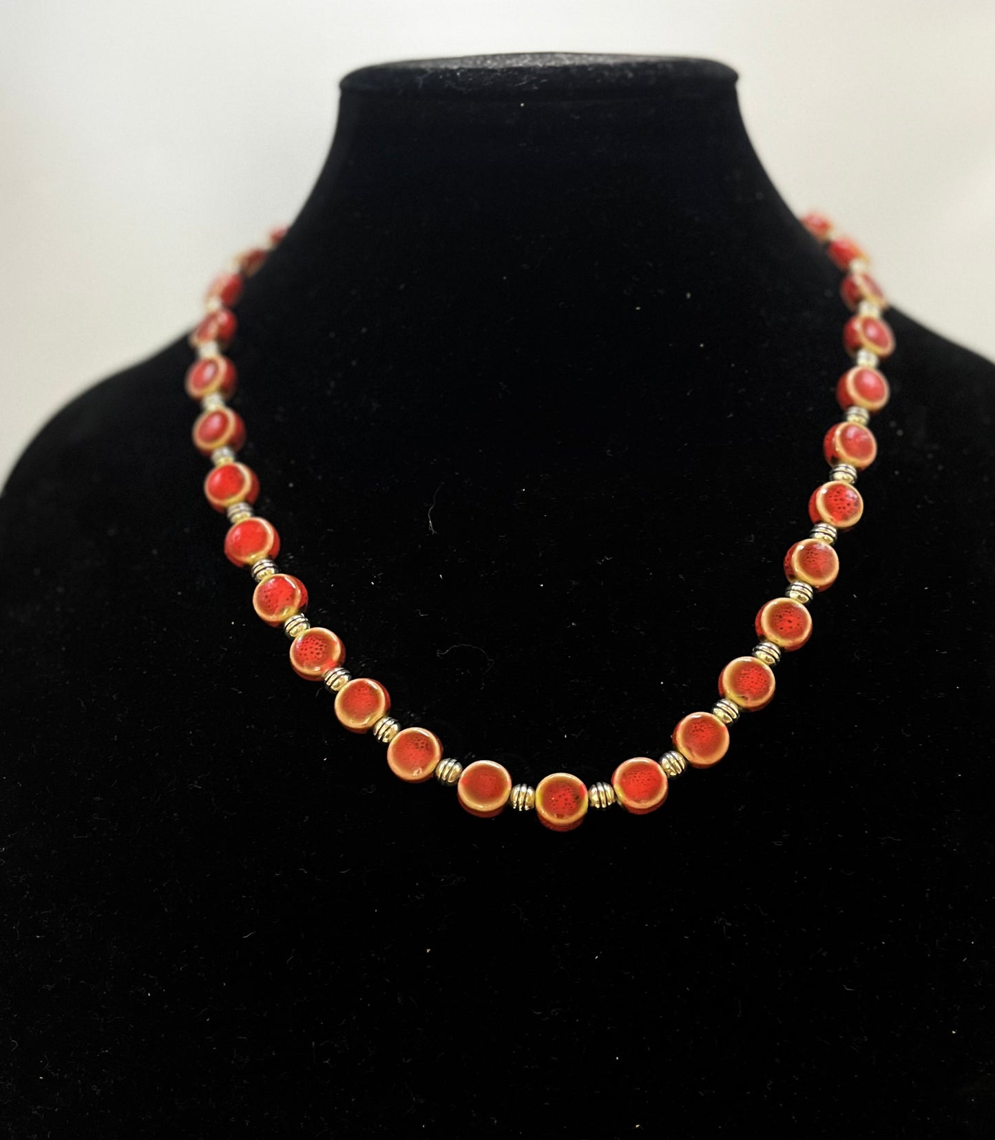 Red ceramic bead necklace with glossy handcrafted finish